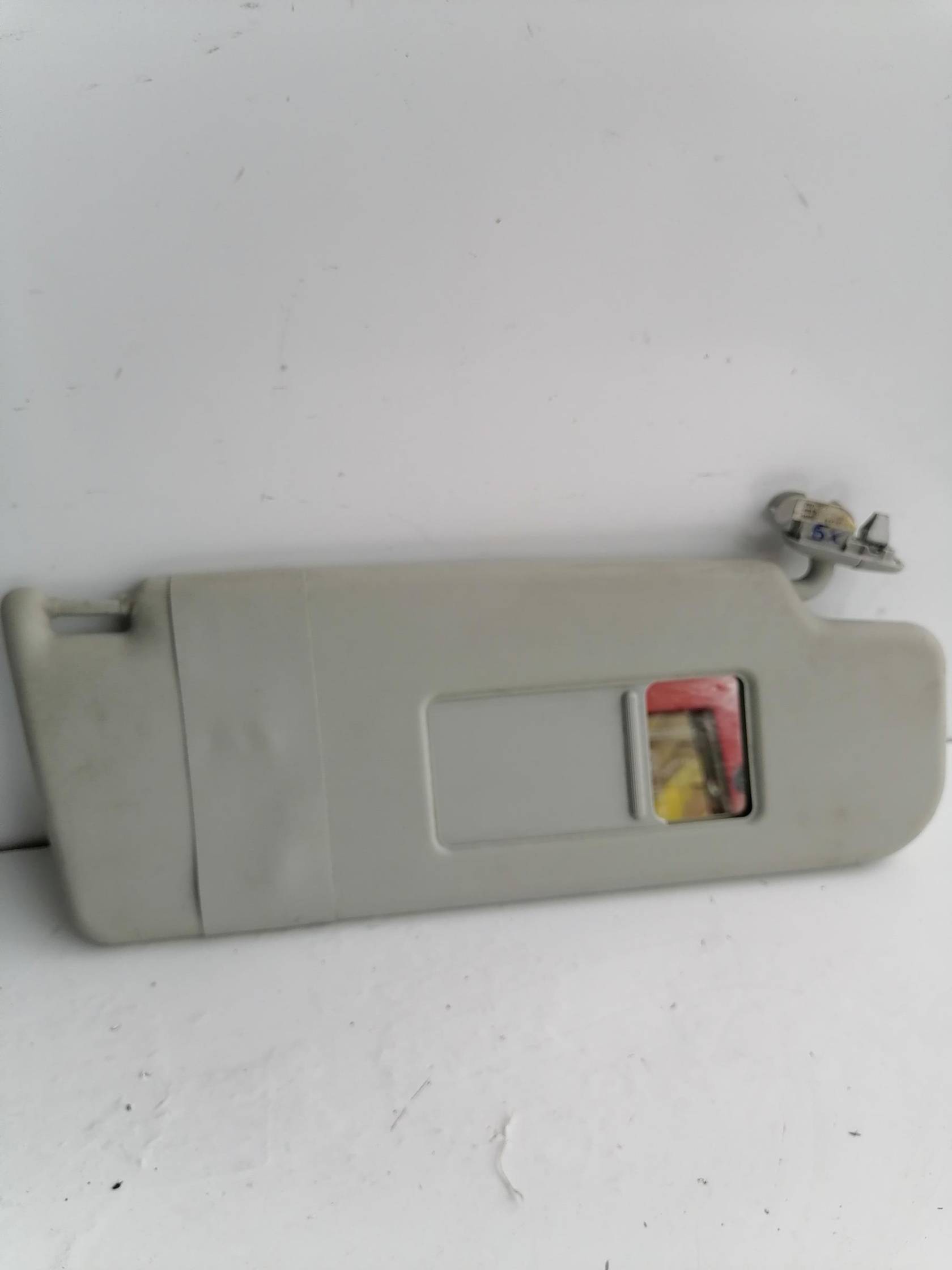 Aletta parasole parabrezza sx.